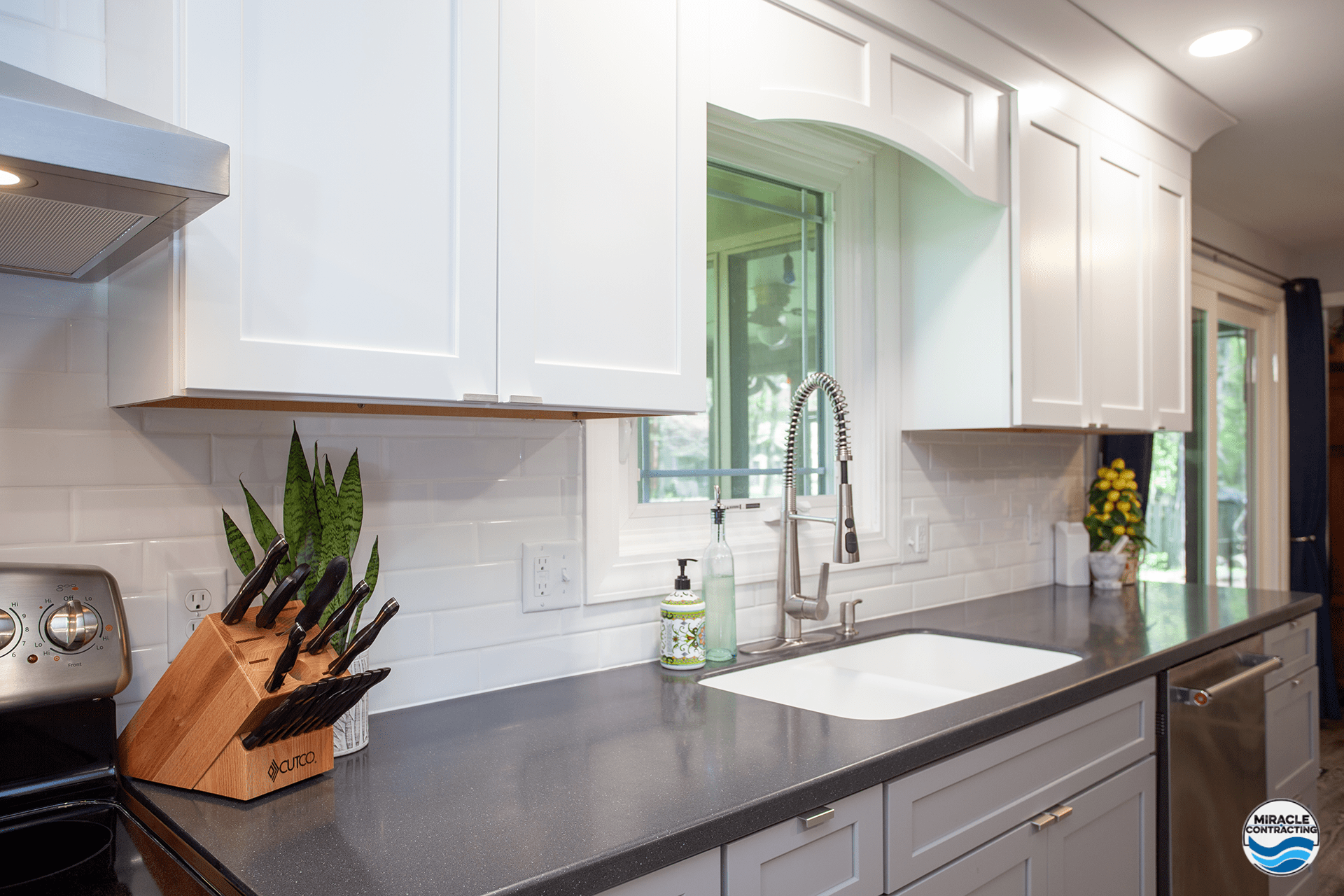 tile backsplash and solid surface counter Miracle Contracting
